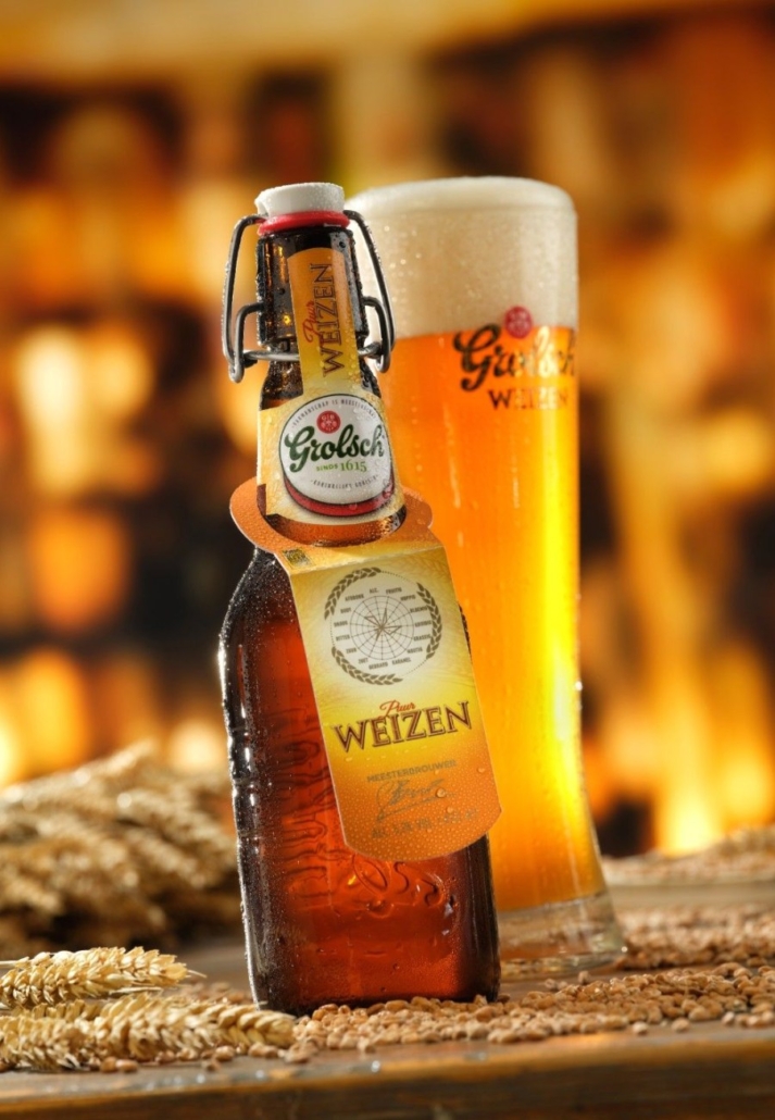 Pivo Pšenice Grolsch Weizen ve sklenici s pěnou